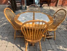 Round oak table with tiled top, 18 inch leaf and four chairs - $345