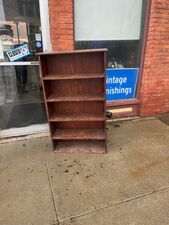 Bookcase 52 inches high in good condition. - $75
