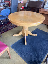 Solid oak pedestal table 42 w/ 18 inch leaf - $225